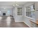 Open-concept room with a fireplace and ample natural light at 12227 Noreast Lake Dr, Tampa, FL 33612