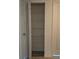 Open closet with white wire shelving on multiple levels at 12403 Hibiscus Oak Pl # 202, Tampa, FL 33612