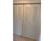 Closet with ventilated doors in this property's interior at 12403 Hibiscus Oak Pl # 202, Tampa, FL 33612