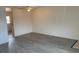 Spacious living room with ceiling fan, neutral walls, and vinyl wood flooring at 12403 Hibiscus Oak Pl # 202, Tampa, FL 33612