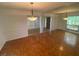 Formal dining room with parquet floors and a decorative chandelier at 13304 Meadowwood Ct, Tampa, FL 33618