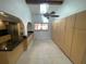 Bright kitchen featuring a skylight, ample storage, and a granite countertop at 13304 Meadowwood Ct, Tampa, FL 33618