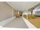 Relaxing covered patio area, perfect for enjoying the outdoors at 14311 Action St, Brooksville, FL 34613