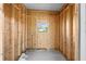 Unfinished storage building has wood studs and plywood and could be converted to a small workspace at 14311 Action St, Brooksville, FL 34613