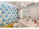 Functional bathroom featuring a shower/tub combination and vanity sink at 1831 Kay Dr, Largo, FL 33770