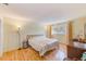 Bright bedroom with hardwood floors, large window, and ample natural light at 1831 Kay Dr, Largo, FL 33770