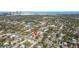 Overhead view of the home with a marker, city skyline and water in background at 1900 17Th S St, St Petersburg, FL 33712