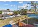 The backyard includes two cars parked and a fence at 1900 17Th S St, St Petersburg, FL 33712