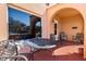 An inviting covered porch with outdoor seating provides a great spot for relaxing at 1900 17Th S St, St Petersburg, FL 33712