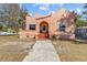 Charming single-story home featuring unique architectural details and a welcoming entryway at 1900 17Th S St, St Petersburg, FL 33712