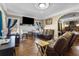 Inviting living room featuring hardwood floors, neutral paint, and comfortable seating arrangements at 1900 17Th S St, St Petersburg, FL 33712