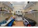 Spacious pantry with shelves, and cabinets for organized storage at 1900 17Th S St, St Petersburg, FL 33712