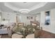 Bright dining area with a glass table and a modern chandelier at 2530 Gary Cir # 401, Dunedin, FL 34698