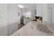 Bright kitchen with marble countertops and stainless steel appliances at 2530 Gary Cir # 401, Dunedin, FL 34698