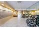 View of the condo building lobby with seating, tile floors, mirrors and mailboxes at 2530 Gary Cir # 401, Dunedin, FL 34698