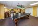 Recreation space includes a pool table, seating area, fitness equipment, and a conference space at 2530 Gary Cir # 401, Dunedin, FL 34698