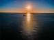 Beautiful aerial view of a body of water with the sun reflecting off the ripples in the water at 2530 Gary Cir # 401, Dunedin, FL 34698