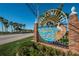Welcome to Dunedin Causeway sign with palm trees and a clear blue sky at 2530 Gary Cir # 401, Dunedin, FL 34698