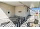Cozy outdoor area, including a covered carport, leading up to the entrance of this lovely home at 3110 Moss Hill St, Wesley Chapel, FL 33543