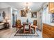Charming dining area showcases stylish chairs, a glass-topped table, and decorative accents at 3110 Moss Hill St, Wesley Chapel, FL 33543