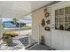 The front entrance is adorned with outdoor décor and a charming covered carport at 3110 Moss Hill St, Wesley Chapel, FL 33543