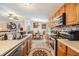 Bright and open kitchen flows into dining area at 3110 Moss Hill St, Wesley Chapel, FL 33543