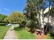 Condo with lush landscaping and mature trees at 3300 Fox Chase N Cir # 229, Palm Harbor, FL 34683