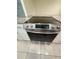 Modern kitchen stove features smooth cooktop, stainless steel, and easy to use digital controls at 3300 Fox Chase N Cir # 229, Palm Harbor, FL 34683