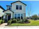 Charming two-story home featuring a beautifully landscaped front yard and inviting entrance at 3367 Janna Grace Way, Land O Lakes, FL 34638