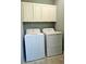 Bright laundry room with a standard washer and dryer at 3367 Janna Grace Way, Land O Lakes, FL 34638
