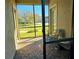 Screened in lanai with brick-paved floor and seating at 3367 Janna Grace Way, Land O Lakes, FL 34638