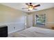 Bedroom featuring tile floors, neutral colors, ceiling fan, and natural light at 3416 S 70Th St, Tampa, FL 33619