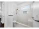 Clean bathroom featuring modern shower and toilet at 3709 W Dale Ave, Tampa, FL 33609