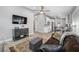 Comfortable living room is open to the kitchen, offering great light and an open concept living space at 3709 W Dale Ave, Tampa, FL 33609