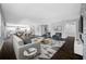 Spacious open-concept living area seamlessly connecting the kitchen, dining, and living spaces at 3709 W Dale Ave, Tampa, FL 33609
