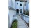 Inviting entryway with landscaped walkway and decorative gate at 4237 Brentwood Park Cir, Tampa, FL 33624