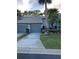 Charming townhome with a two-car garage and mature landscaping at 4237 Brentwood Park Cir, Tampa, FL 33624