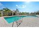 A beautiful community pool with inviting turquoise water and a spacious sun deck at 4237 Brentwood Park Cir, Tampa, FL 33624