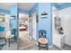 Well-lit bathroom with a tiled walk-in shower, ample cabinet space, and views into the bedroom at 4614 Sandpointe Dr, New Port Richey, FL 34655