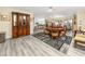 Open-concept floor plan with a dining room, kitchen, and living area for easy entertaining at 4614 Sandpointe Dr, New Port Richey, FL 34655