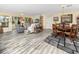 Spacious living room featuring ample seating, and lots of natural light, perfect for relaxation at 4614 Sandpointe Dr, New Port Richey, FL 34655