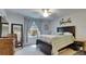 This spacious bedroom features a ceiling fan, a large window, and natural light at 5312 Sylvester Loop, Tampa, FL 33610