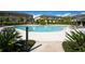 Community pool with plenty of lounge chairs and a bright, open space, perfect for residents to relax and socialize at 5312 Sylvester Loop, Tampa, FL 33610
