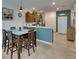 Open kitchen and dining area with breakfast bar, ideal for entertaining at 5312 Sylvester Loop, Tampa, FL 33610