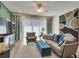 Comfortable living room with stylish decor, tile floors, and bright natural light at 5312 Sylvester Loop, Tampa, FL 33610