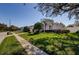 A well-manicured front yard adds to the curb appeal of this lovely single-story residence at 6305 S Queensway Dr, Temple Terrace, FL 33617