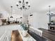 Open floorplan with a combined living area, dining area, and fireplace at 6930 Ripple Pond Loop, Zephyrhills, FL 33541