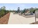 Well-maintained playground with slides and benches in a secure, fenced area for to enjoy at 6930 Ripple Pond Loop, Zephyrhills, FL 33541