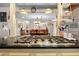 Kitchen view featuring a stovetop and a view into the dining area at 8518 Delaware Dr, Weeki Wachee, FL 34607