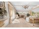 Cozy living room featuring a fireplace, plush carpeting, and elegant decor creating a warm and inviting atmosphere at 8518 Delaware Dr, Weeki Wachee, FL 34607
